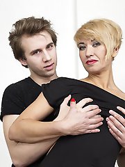 Hot mom playing around with her toy boy