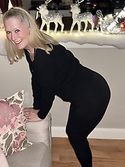 Hot MILF Tia posing in pink underwear for a photo session